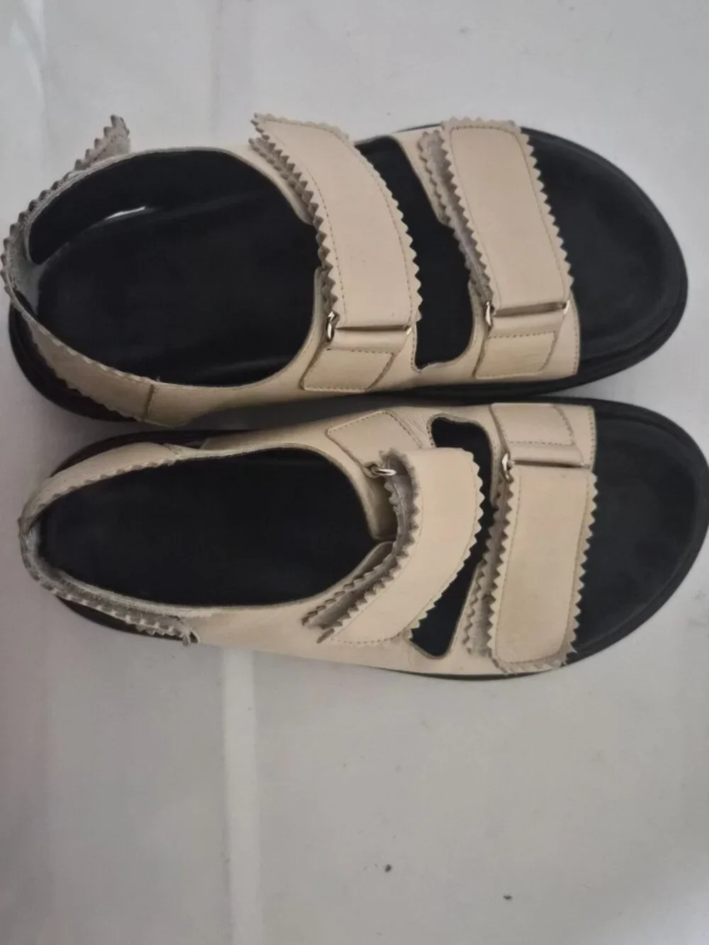 Maguire Cream and Black Minimalist Sandals with Two-Strap Design